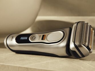 Braun Series 9 shaver on beige countertop.