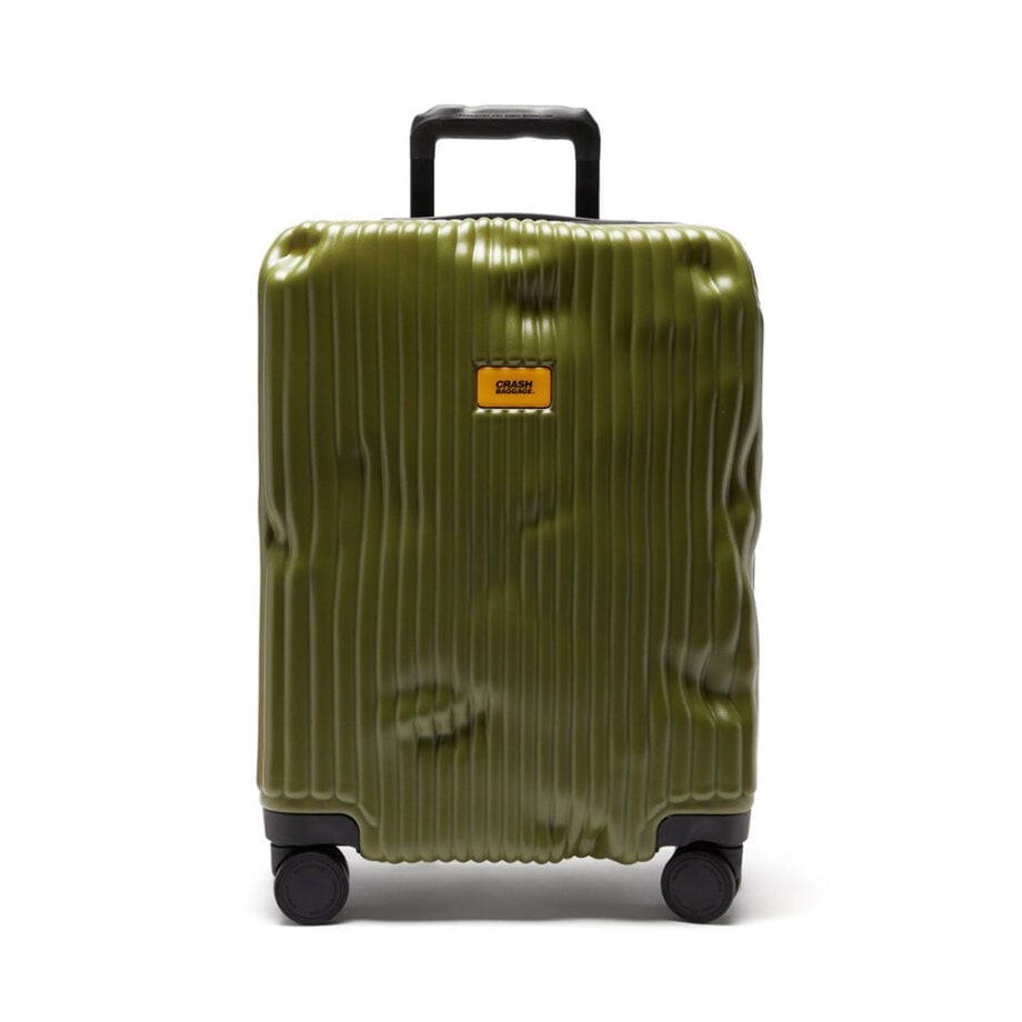 Green suitcase with wheels, label hints top luggage brands.