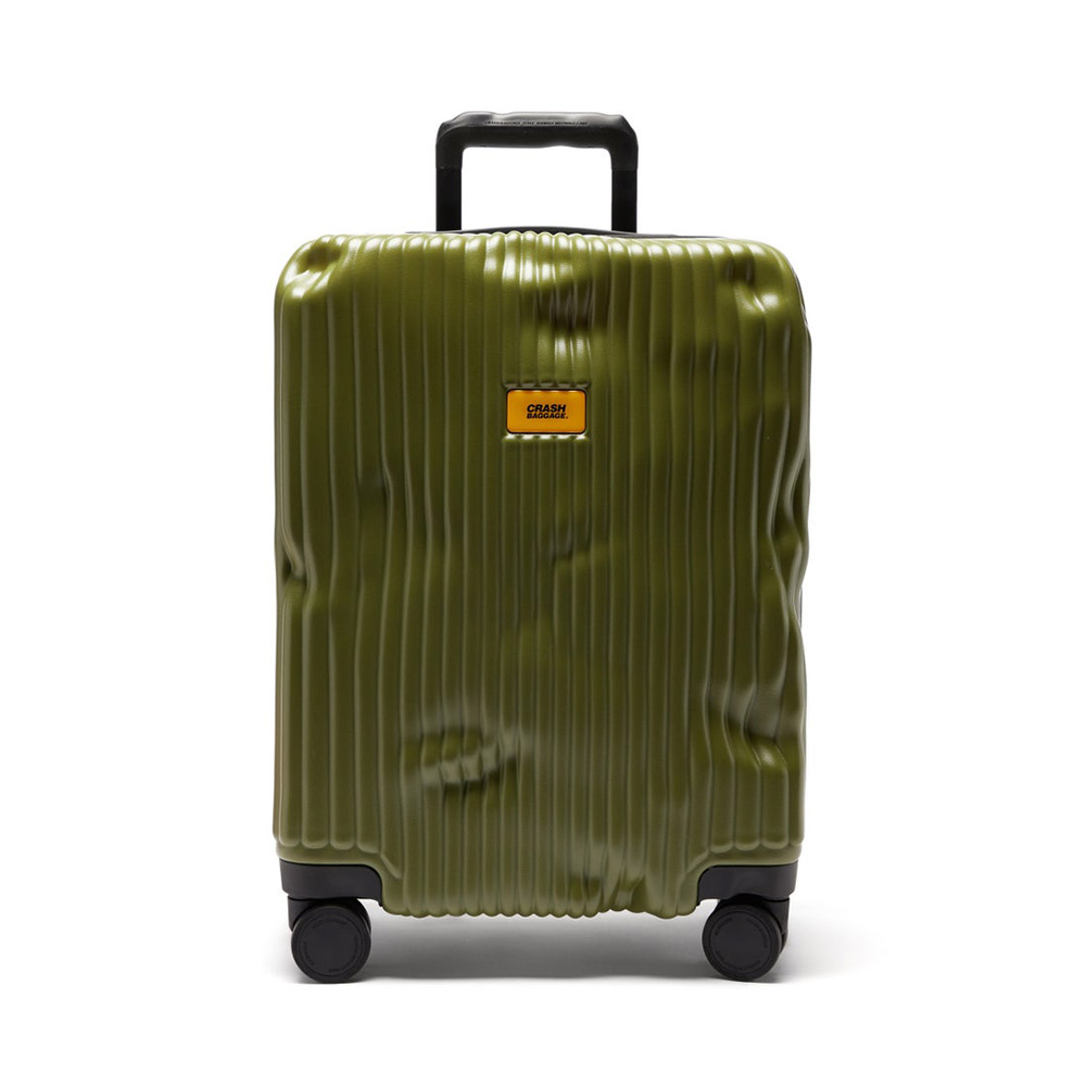 Green suitcase with wheels, label hints top luggage brands.