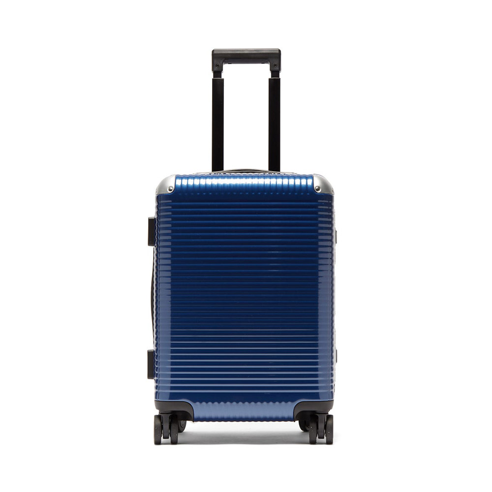Blue hard-shell suitcase with retractable handle.