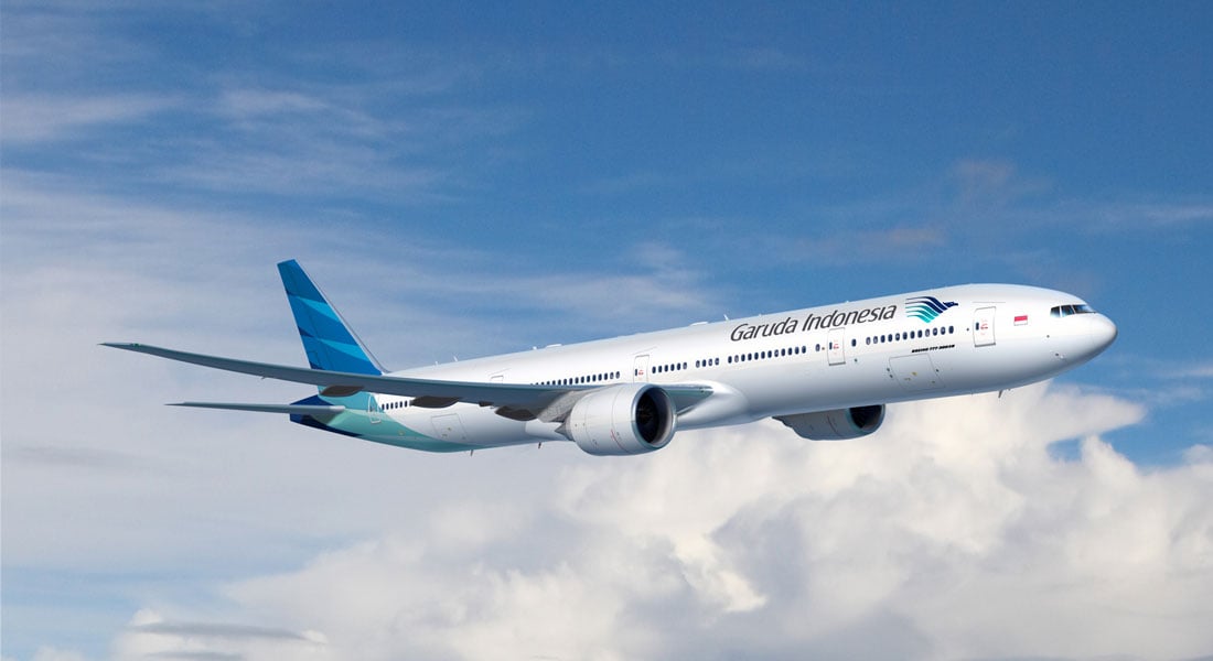 Garuda Indonesia airplane flying high.