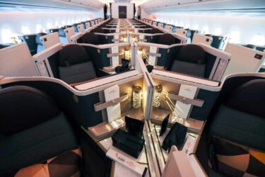 Etihad A350 business cabin: spacious, modern, and private.