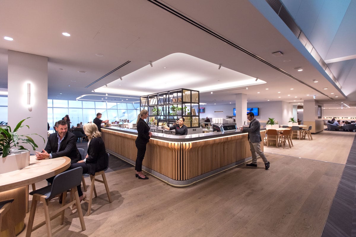 Qantas lounge with modern design and amenities.