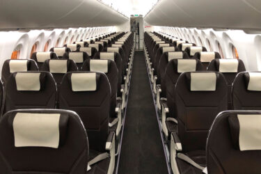 European Business Class features leather seats, elegant design.