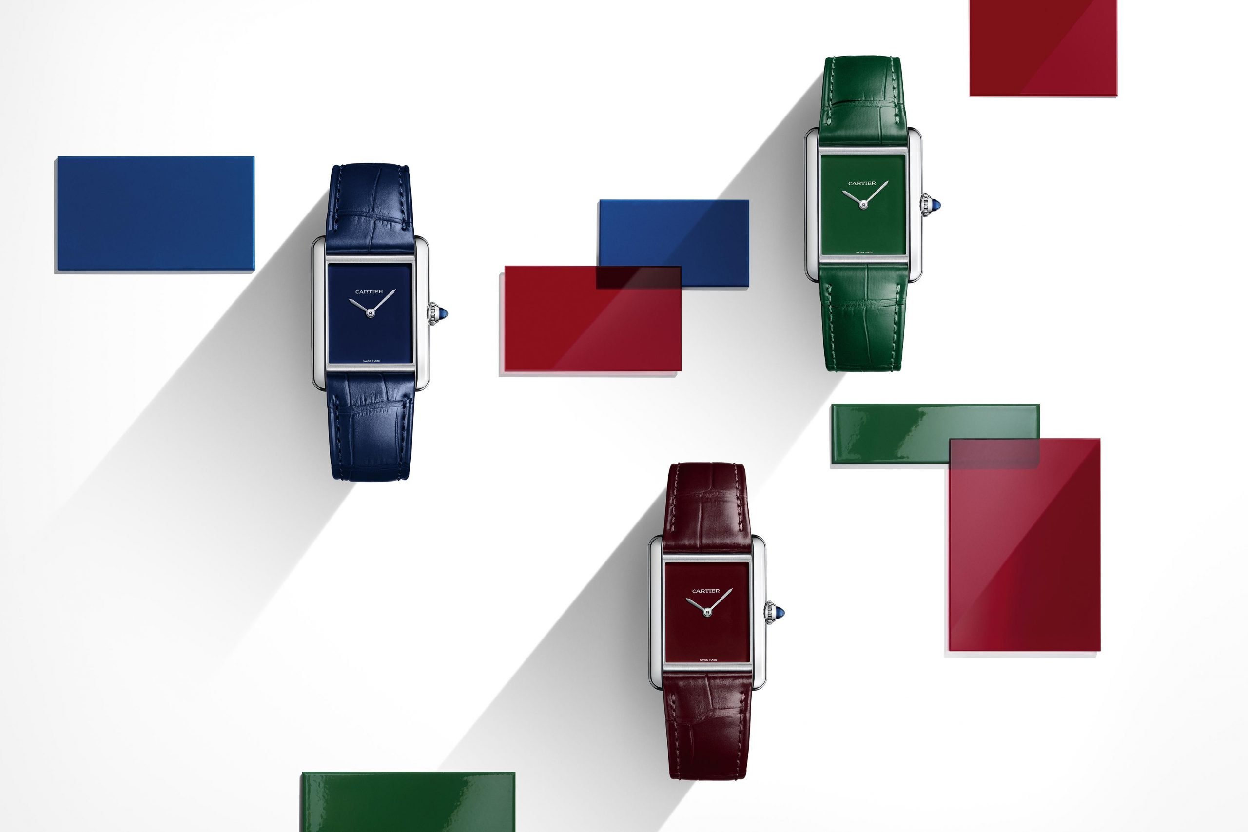 Retro square watches with vibrant leather straps.