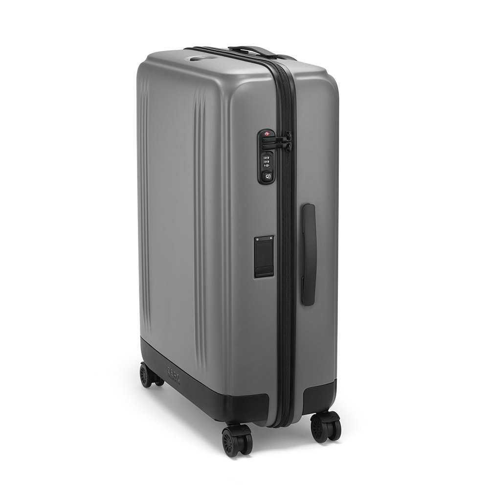 Gray suitcase with sleek design and mobility.