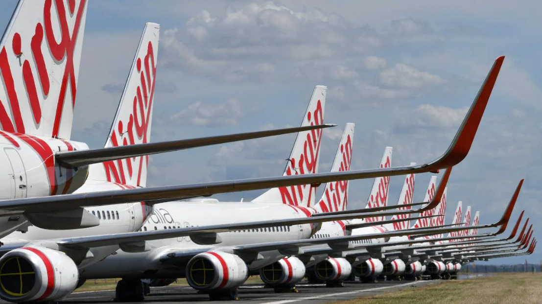 Virgin planes line Australian tarmac.